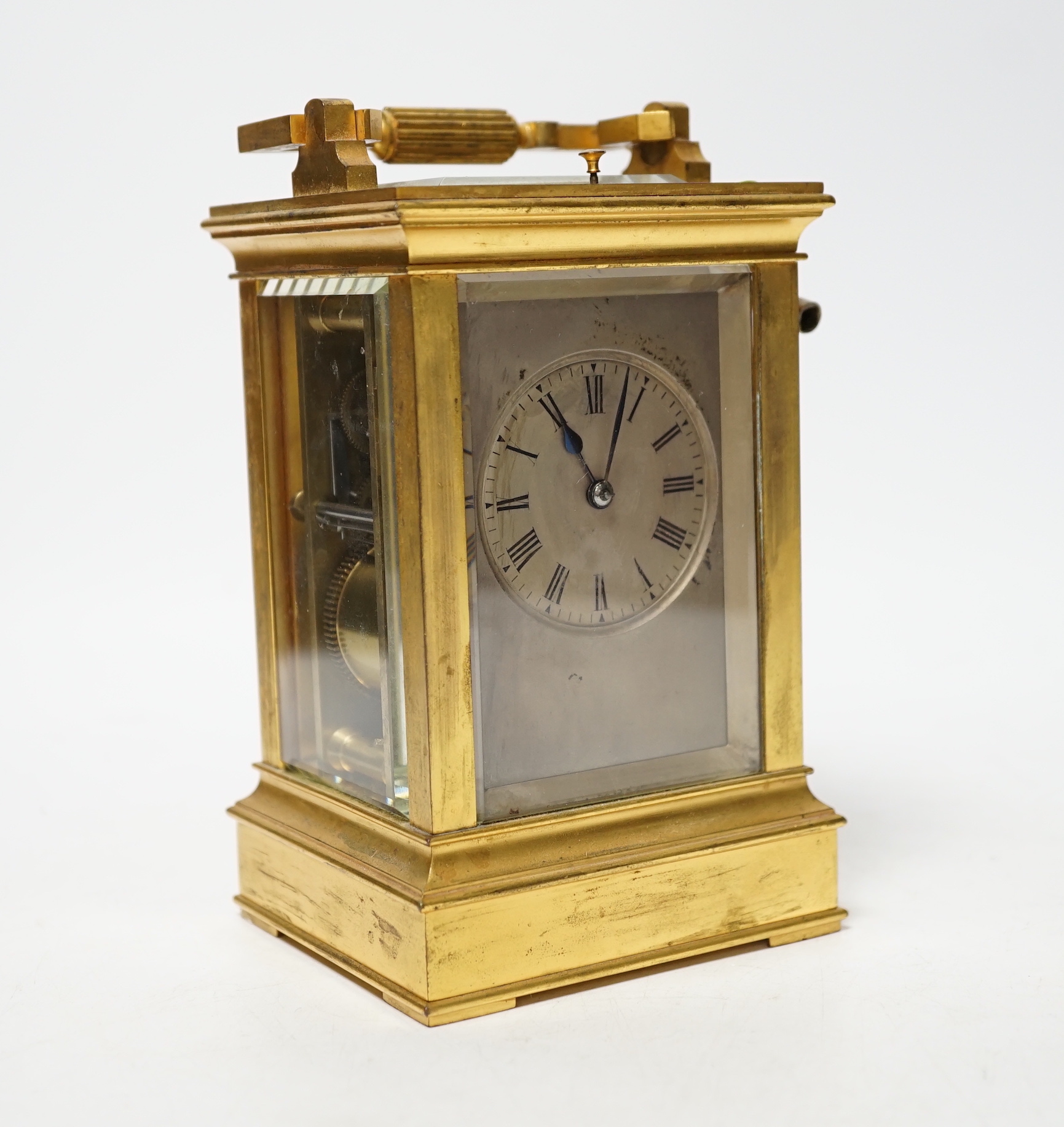 A late 19th century French gilt brass cased eight day repeating carriage clock with key, 17cm